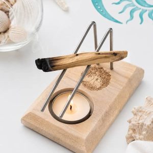 Quemador artesanal de palo santo con base de madera grabada con el Arbol de la Vida