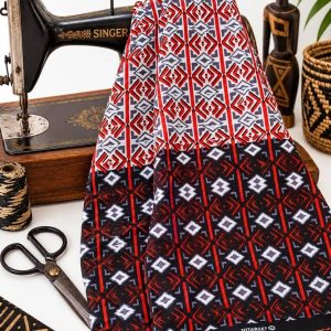 Tela africana wax auténtica marca Hitarget con estampado geométrico rojo y negro